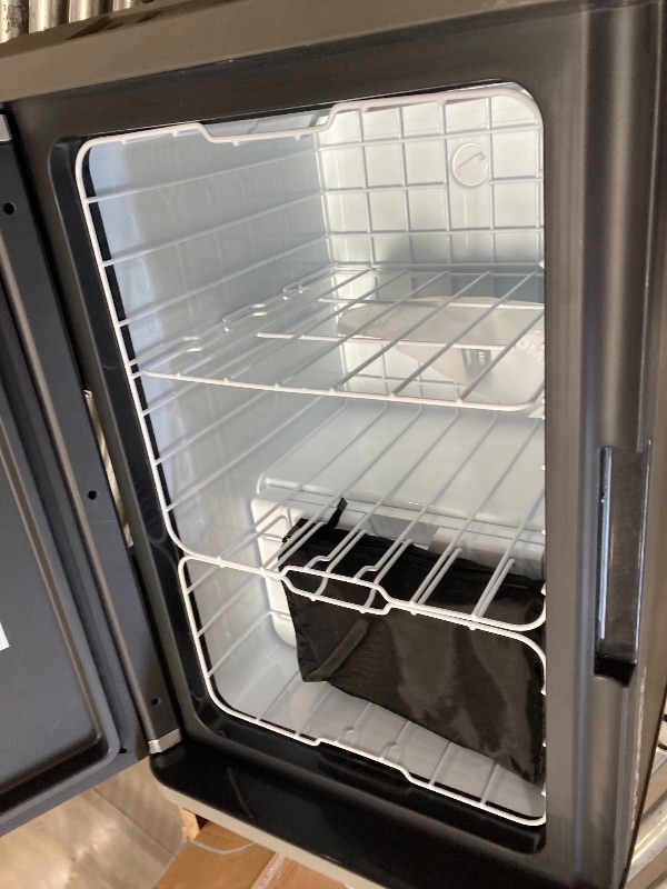 Photo 1 of ***USED - DAMAGED - NO PACKAGING - DOESN'T POWER ON - UNABLE TO TROUBLESHOOT***
Dometic CFX5 55 Liter IM Portable Refrigerator and Freezer, Powered by AC/DC