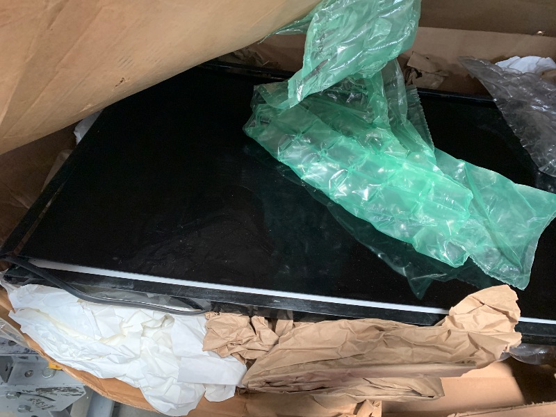 Photo 1 of **************HEAVILY DAMAGED, NON-FUNCTIONAL, FINAL SALE****************

SAMSUNG 40-inch Class LED Smart FHD TV 1080P (UN40N5200AFXZA, 2019 Model), Black