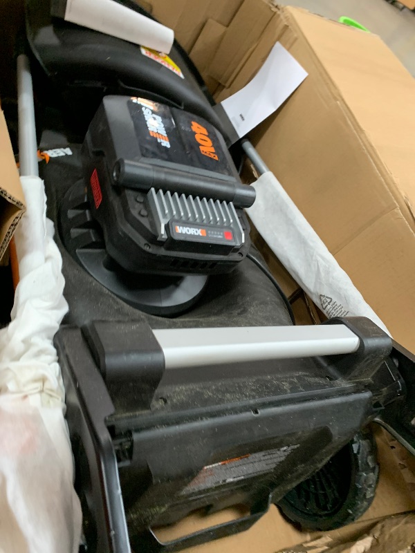 Photo 1 of *****************MISSING THE CHARGER****************

WORX Nitro 40V 21" Cordless Lawn Mower w/Aerodeck & Intellicut, Brushless Electric Mower Up to 1/2 Acre, Push Lawn Mower w/ 7-Position Height Adjustment WG752 – Batteries & Charger Included