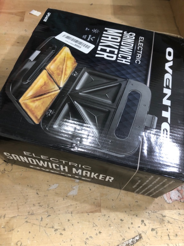 Photo 1 of OVENTE Electric Sandwich Maker with Non-Stick Plates, Indicator Lights, Cool Touch Handle, Easy to Clean and Store, Perfect for Cooking Breakfast, Grilled Cheese, Tuna Melts and Snacks, Black GPS401B