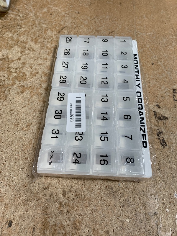 Photo 1 of 31 compartments, 1 per Day, 4 Week Monthly Pill Organizer by Promed. Includes Tray and 8 Removable compartments. (White)