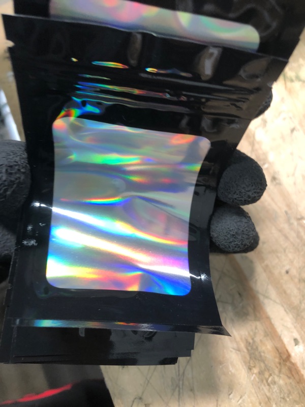 Photo 1 of joycraft 100 Pcs Mylar Bags, Holographic Packaging Bags, Resealable Smell Proof Bags, Jewelry Pouch Bag for Small Business, Clear Foil Pouch Bag for Candy,...
