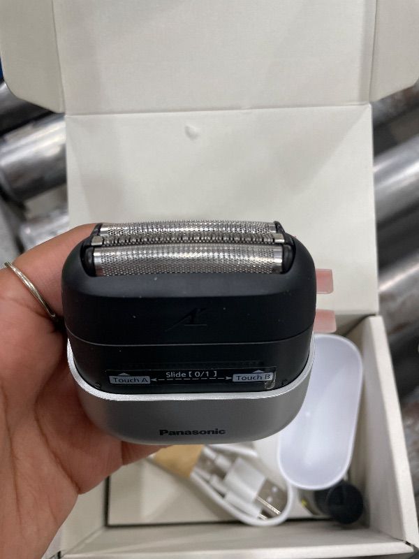 Photo 1 of Panasonic ARC5 Palm-Sized Electric Razor, Handheld Luxury Compact Shaver with Upcycled Body, 5-Blade Cutting System, and USB-C Charging, Wet/Dry - ES-PV6A-W