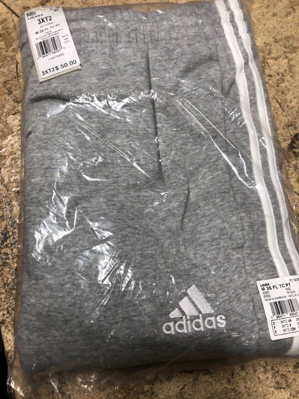 Photo 1 of adidas Men's Tall Size Essentials Fleece 3-Stripes Tapered Cuff Pants, Medium Grey Heather 3XT2