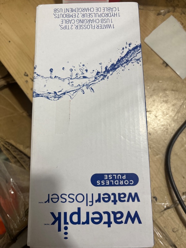 Photo 1 of Waterpik Cordless Pulse Rechargeable Portable Water Flosser for Teeth, Gums, Braces Care and Travel with 2 Flossing Tips, Waterproof, ADA Accepted, WF-20 White, Packaging May Vary