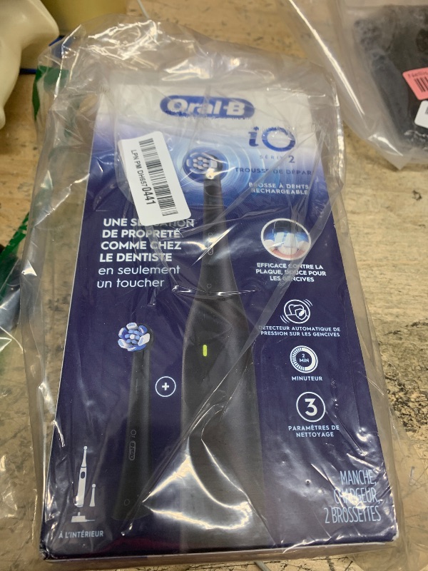 Photo 1 of Oral-B iO Series 2 Rechargeable Electric Powered Toothbrush Starter Kit, Night Black with 2 Brush Heads - Automatic Pressure Sensor to Protect Gums - 3 Modes - 2 Min Timer