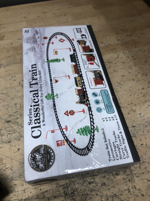 Photo 1 of JUQU Train Set-Electric Train Sets for Boys Toddlers Classical Train Toys,Battery-Powered Locomotive Engine with Sound and Lights, 3 Cars &10 Tracks, Christmas Toy Train for Age 3 4 5 6 Years Old Kids