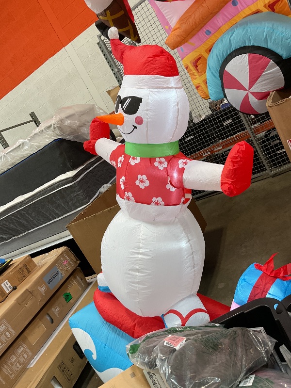 Photo 1 of Inflatable Christmas Decorations Outdoor, Elegear 6FT Inflatable Snowman with LED Lights Surfing Snowman Blow Up Yard Decorations Xmas Decorations for Xmas Party Indoor Outdoor Home Garden Lawn