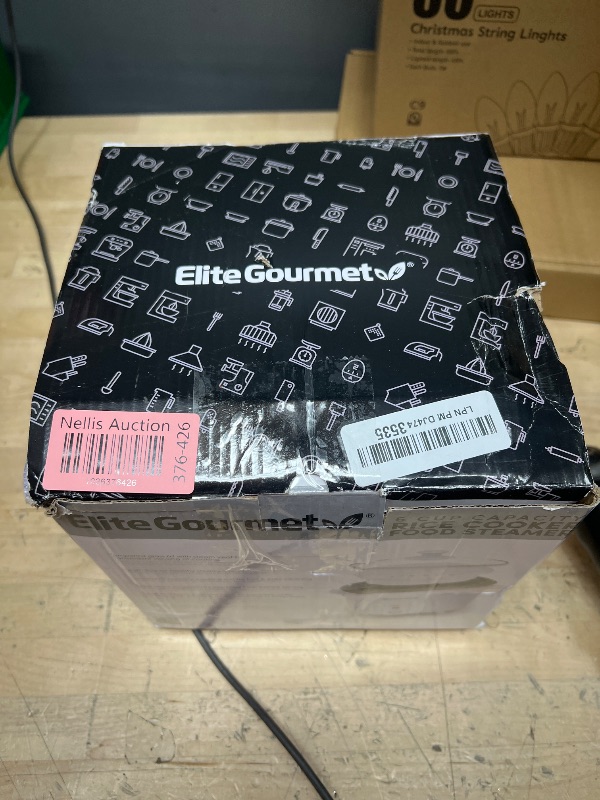 Photo 1 of Elite Gourmet ERC-006NST Maxi-Matic Electric Rice Cooker with Non-Stick Inner Pot Makes Soups, Stews, Grains, Cereals, Keep Warm Feature, 6 Cups Cooked (3 Cups Uncooked), White