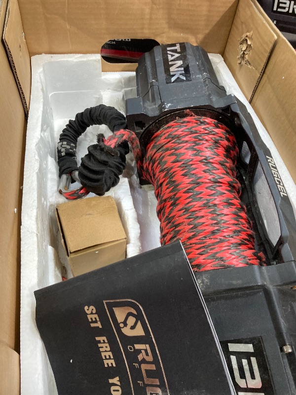 Photo 1 of ****DOES NOT WORK/PARTS ONLY***RUGCEL 13500lb New Waterproof Electric Synthetic Rope Winch 12V with Hawse Fairlead,2 in 1 Wireless remote control, wired control,Double color rope,for Truck SUV