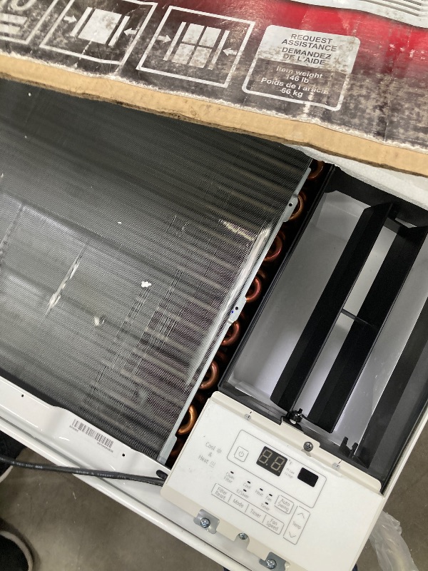 Photo 1 of ***OPEN BOX, SOME SCUFFS/SCRATCHES, DENT/BENT ON CORNER EDGE)***                      LG 18,000 BTU Window Air Conditioner with Heat, 230/208V, Cools 1,000 Sq.Ft. for Bedroom, Living Room, Basement, Apartment, with Remote, 2 Speeds, 24-Hour Timer, White