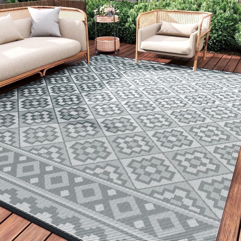 Photo 1 of SIXHOME Outdoor Rug 9'x12' Waterproof Reversible Patio Rug Modern Lightweight Plastic Straw Indoor Outdoor Rug for RV Camping Deck Balcony Porch Boho Patio Decor Outdoor Carpet Light Gray