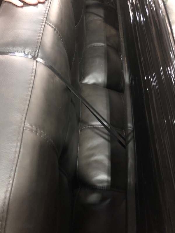Photo 1 of (used, appears new) ***TRUCK/TRAILER PICKUP ONLY***Signature Design by Ashley Luigi Modern Tufted Leather Match Sofa, Black
