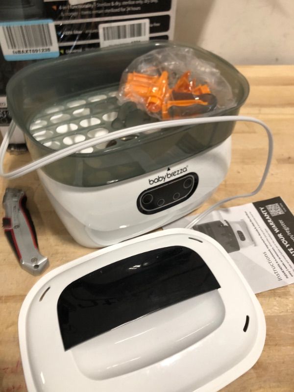 Photo 1 of **MISSING SOME PIECES**Baby Brezza Bottle Sterilizer and Dryer Advanced – Electric Steam Sterilization Machine Universal Sterilizing for All Bottles: Plastic + Glass Pacifiers Breast Pump Parts - HEPA Filtration,