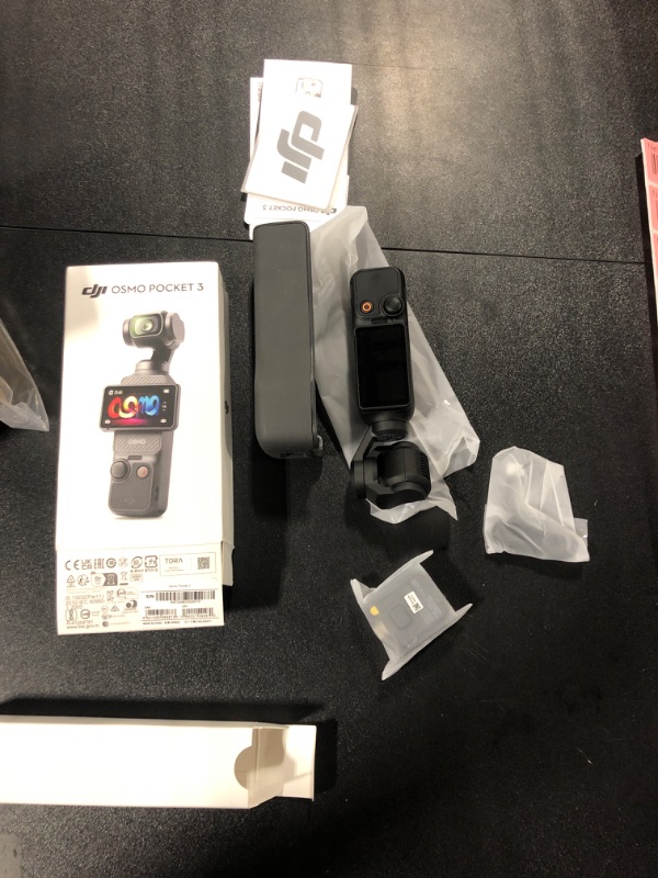 Photo 1 of DJI Osmo Pocket 3, Vlogging Camera with 1'' CMOS & 4K/120fps Video, 3-Axis Stabilization, Fast Focusing, Face/Object Tracking, 2" Rotatable Touchscreen, Digital Camera for Photography, YouTube
