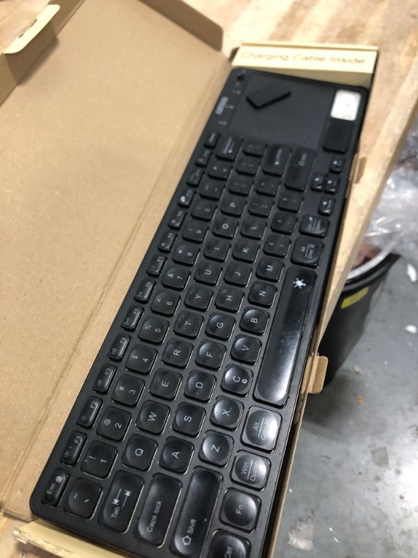 Photo 1 of Arteck Universal Backlit 7-Colors Bluetooth Touch TV Keyboard with Easy Media Control and Build-in Touchpad for TV-Connected Computer, Smart TV, Desktop, Laptop, iPad, Surface, Tablet, HTPC