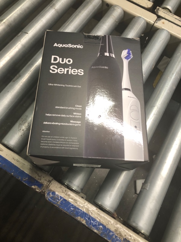 Photo 1 of Aquasonic Duo - Dual Handle Ultra Whitening 40,000 VPM Wireless Charging Electric ToothBrushes - 3 Modes with Smart Timers - 10 Dupont Brush Heads & 2 Travel Cases Included