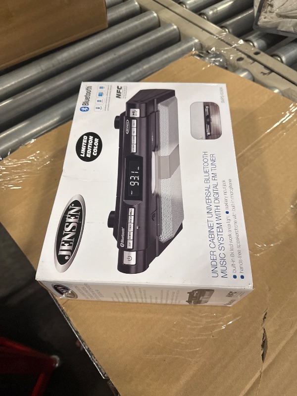 Photo 1 of Jensen Modern Wireless Under Cabinet Kitchen Universal Bluetooth Music System, FM Radio, Clock LCD Digital Display, Built-in Hands-Free Mic & Speakers (Includes Mounting Hardware)