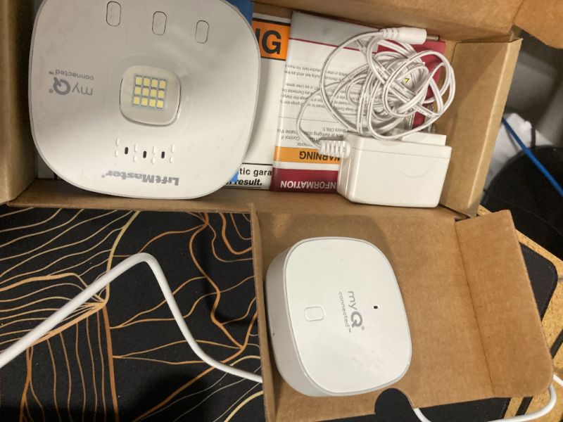 Photo 1 of Liftmaster myQ Smart Garage Control - Wireless Garage Hub and Sensor with WiFi & Bluetooth - Smartphone Controlled, 821LMC-S, White