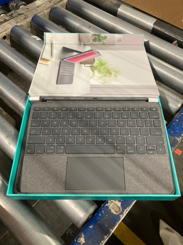 Photo 1 of Logitech Combo Touch for iPad (7th, 8th and 9th generation) keyboard case with trackpad, wireless keyboard, Smart Connector technology - Graphite