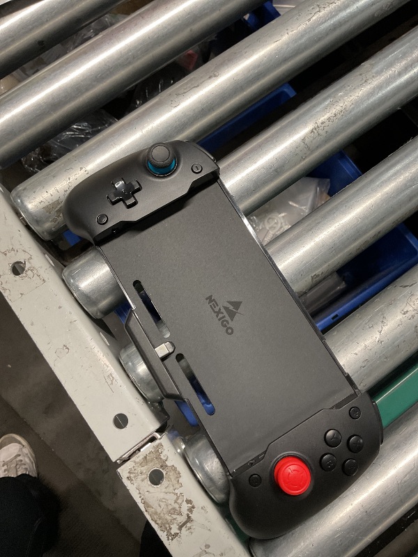 Photo 2 of **MAY HAVE ISSUES CONNECTING**NexiGo Gripcon Switch Controller for Handheld Mode, Ergonomic Controller for Nintendo Switch with 6-Axis Gyro, Dual Motor Vibration, Compatible with All Games of Switch, Not for OLED