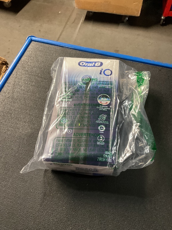 Photo 1 of Oral-B iO Deep Clean Rechargeable Electric Powered Toothbrush, Black with iO Series 3 Limited, 2 Brush Heads and Travel Case - Pressure Sensor to Protect Gums - 3 Cleaning Settings - 2 Minute Timer