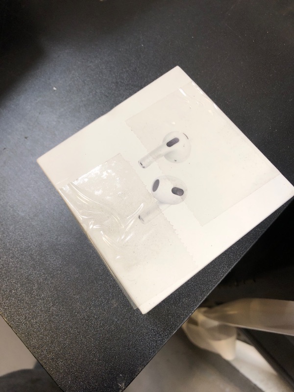 Photo 4 of Apple AirPods (3rd Generation) Wireless Ear Buds, Bluetooth Headphones, Personalized Spatial Audio, Sweat and Water Resistant, Lightning Charging Case Included, Up to 30 Hours of Battery Life