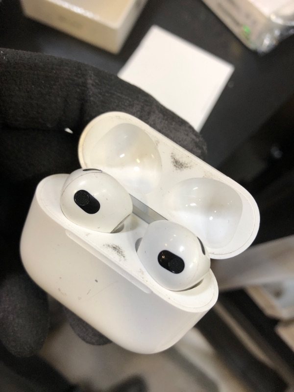 Photo 2 of Apple AirPods (3rd Generation) Wireless Ear Buds, Bluetooth Headphones, Personalized Spatial Audio, Sweat and Water Resistant, Lightning Charging Case Included, Up to 30 Hours of Battery Life