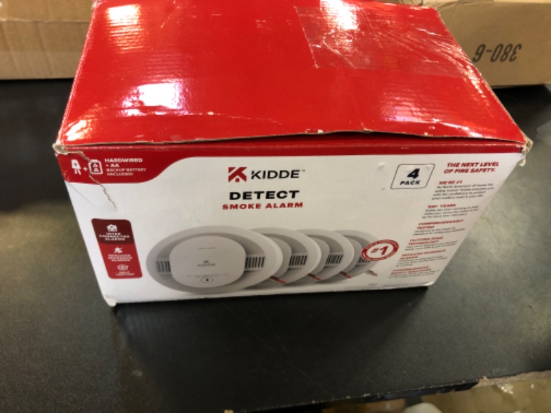 Photo 2 of Kidde Hardwired Smoke Detector, AA Battery Backup, Interconnectable, LED Warning Light Indicators, 4 Pack