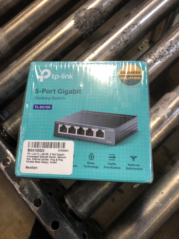 Photo 1 of TP-Link TL-SG105, 5 Port Gigabit Unmanaged Ethernet Switch, Network Hub, Ethernet Splitter, Plug & Play, Fanless Metal Design, Shielded Ports, Traffic Optimization,Navy Blue