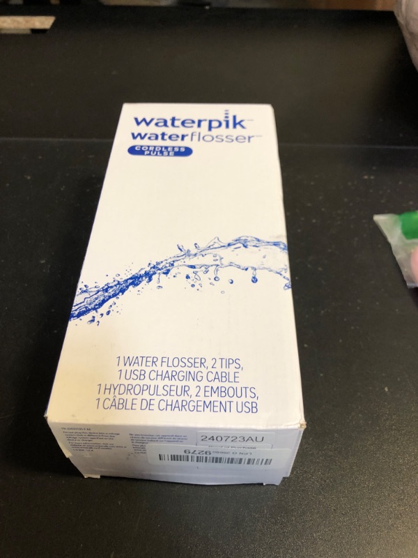 Photo 2 of Waterpik Cordless Pulse Rechargeable Portable Water Flosser for Teeth, Gums, Braces Care and Travel with 2 Flossing Tips, Waterproof, ADA Accepted, WF-20 Blue, Packaging May Vary