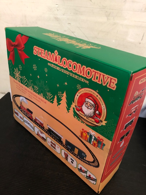 Photo 1 of OleFun Christmas Train Set, Electric Train with Water Steam, Sounds & Lights, Model Train Set for Under The Xmas Tree, Railway Kit Gifts for 3, 4, 5, 6, 7, 8+ Year Old Boy & Girl