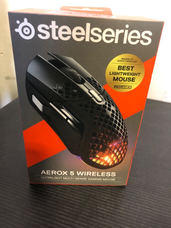 Photo 2 of SteelSeries Aerox 5 Wireless - Holey RGB Gaming Mouse - Ultra-lightweight Water Resistant Design - 9 Buttons – Bluetooth/2.4 GHz - 18K DPI TrueMove Air Optical Sensor