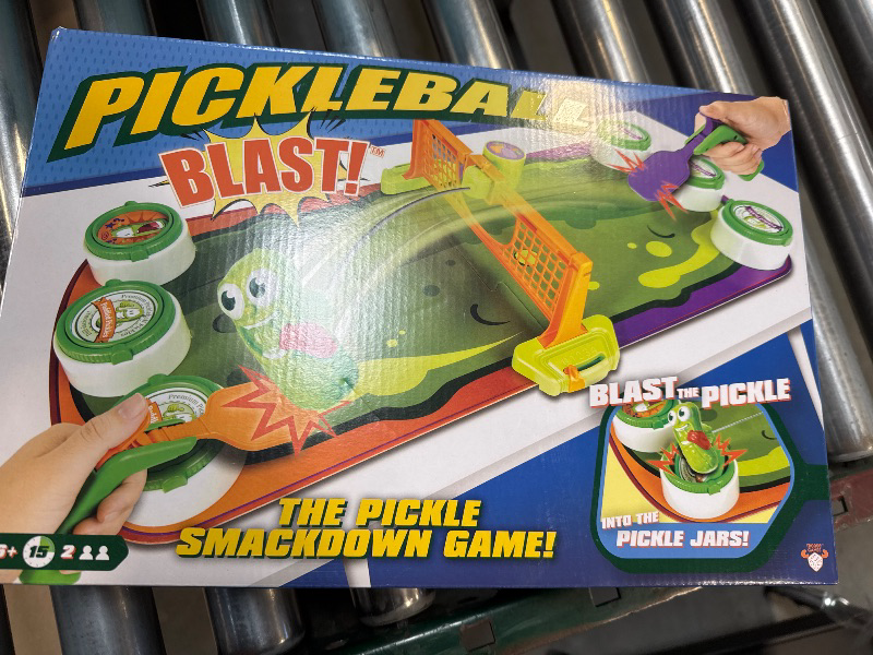 Photo 2 of Pickleball Blast - The Pickle Smackdown Game, Players Will Love to Smash the Wildly Wiggling Pickle With Their Pickleball Paddle & Try to Flip Over the Pickle Jar Lids to Win, For 2 People, Aged 6+