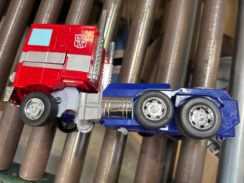 Photo 2 of Jada Toys Autobot Optimus Prime Transformers Car & Truck Play Vehicles, Red
