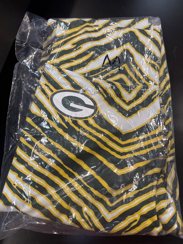 Photo 2 of Zubaz NFL Women's Basic Zebra Print Legging, Green Bay Packers Medium
