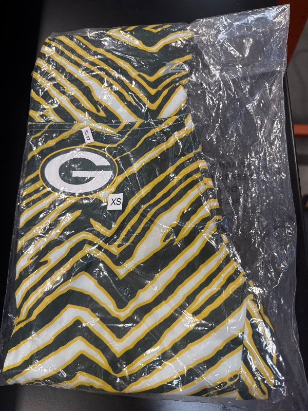 Photo 2 of Zubaz NFL Women's Basic Zebra Print Legging, Green Bay Packers XS