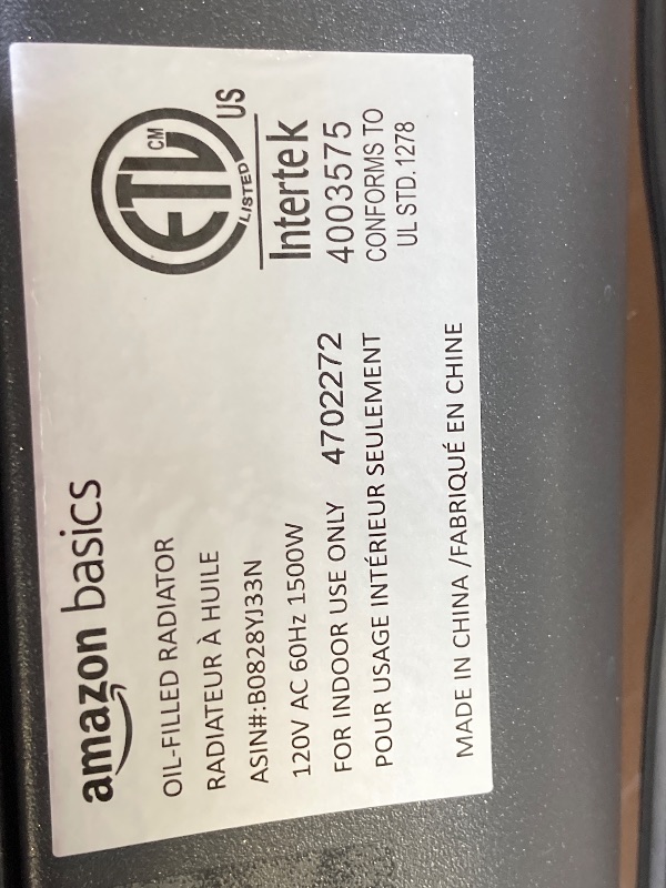 Photo 3 of Amazon Basics Oil Space Heater with Remote Control, Portable Radiator Heater with 7 Oil-Filled Fins Indoor Uses, 3 Heat Settings, Thermostat, Tip-Over Protection, ETL Safety Certificate, 1500W, Black