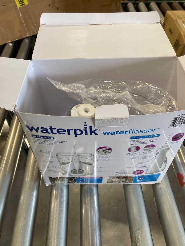 Photo 4 of Waterpik Ultra Plus and Cordless Pearl Water Flosser Combo Pack
