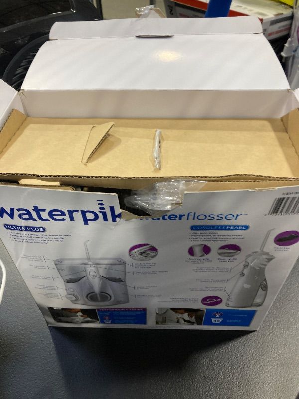 Photo 2 of Waterpik Ultra Plus and Cordless Pearl Water Flosser Combo Pack
