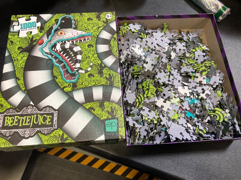 Photo 1 of Beetlejuice Sandworm! 1,000 Piece Jigsaw Puzzle, Dimensions 19” x 27”, Featuring The Sandworm from Tim Burton’s Classic Film, Challenging and Engaging Officially Licensed Beetlejuice Merchandise