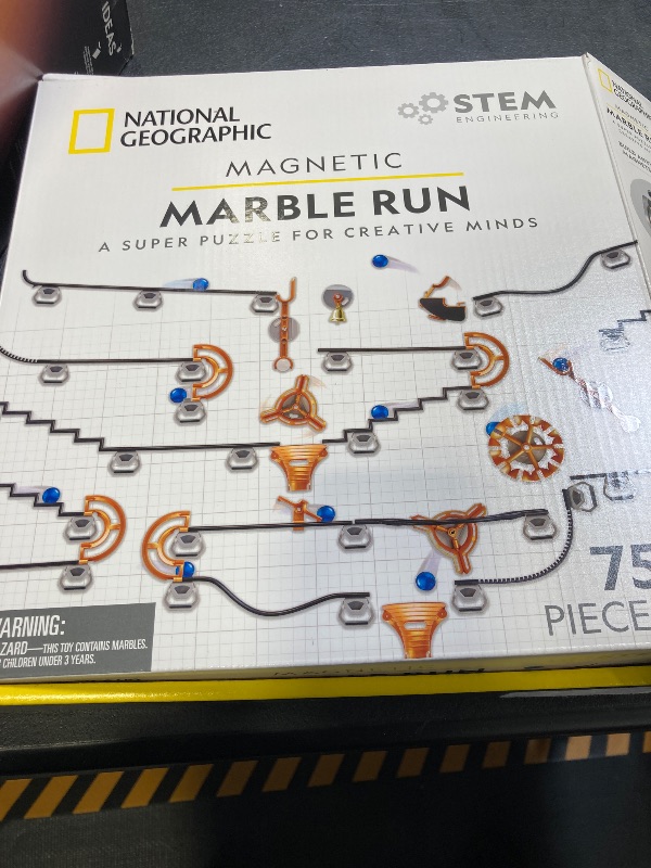 Photo 1 of NATIONAL GEOGRAPHIC Magnetic Marble Run - 75-Piece STEM Building Set for Kids & Adults with Magnetic Track & Trick Pieces & Marbles for Building A Marble Maze, STEM Project (Amazon Exclusive)