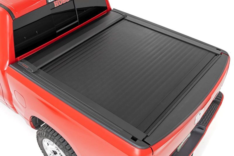 Photo 1 of Rough Country Retractable Bed Cover for 19-23 Ram 1500 | 5 7 Bed- 46320551A
