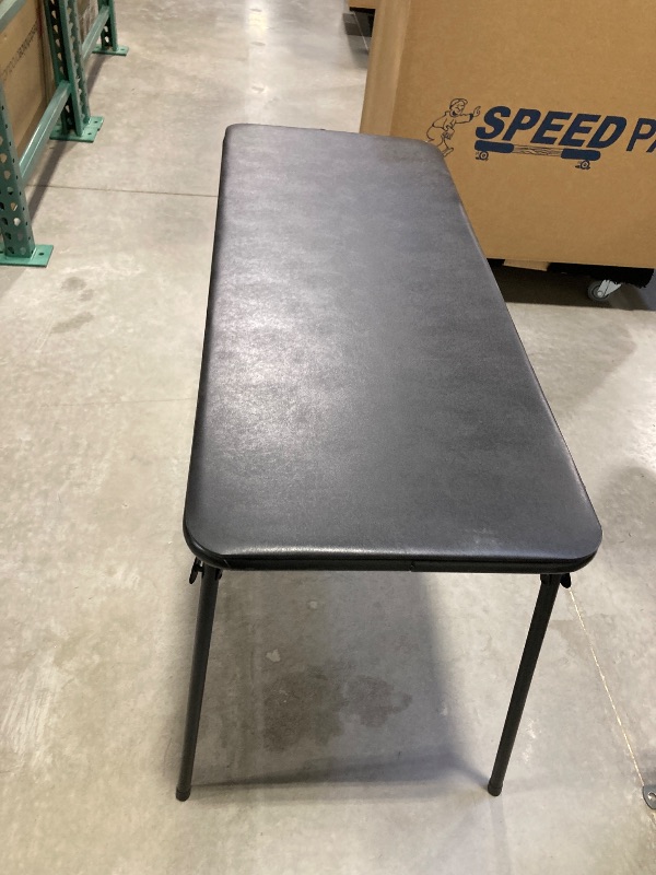 Photo 2 of 4'  Small black foldable table 