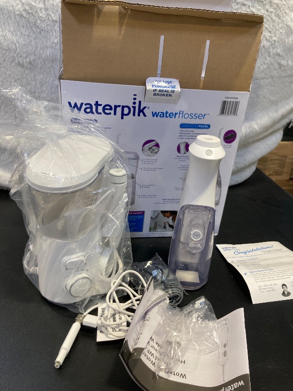 Photo 3 of Waterpik Ultra Plus and Cordless Pearl Water Flosser Combo Pack