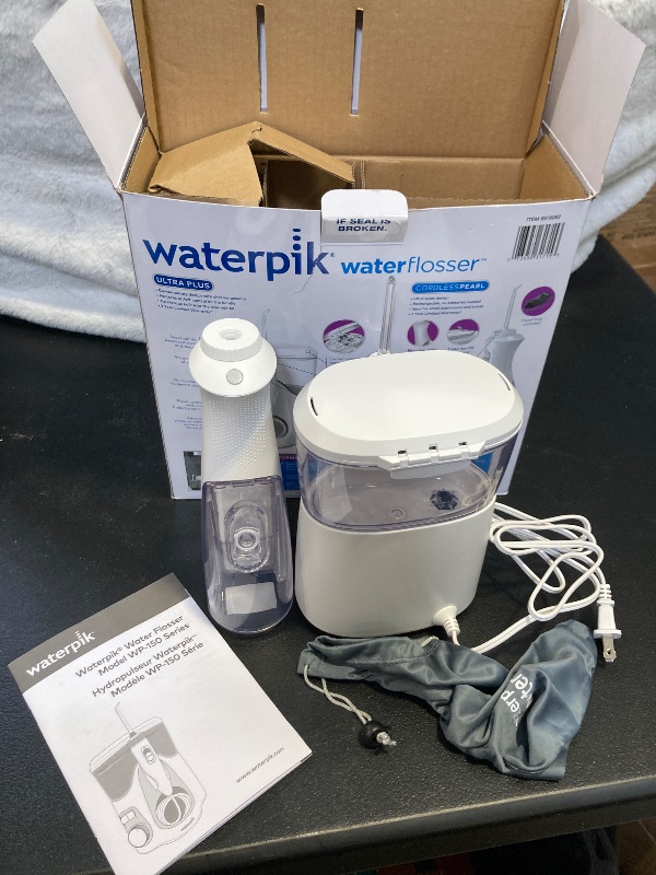 Photo 2 of Waterpik Ultra Plus and Cordless Pearl Water Flosser Combo Pack