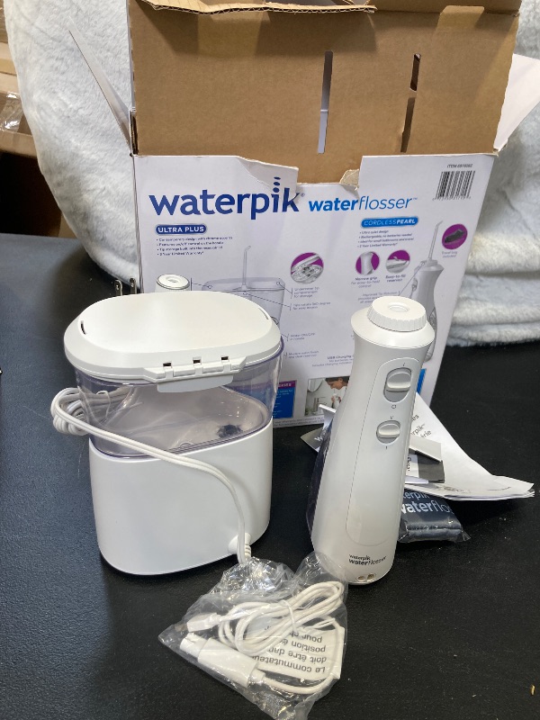 Photo 3 of Waterpik Ultra Plus and Cordless Pearl Water Flosser Combo Pack