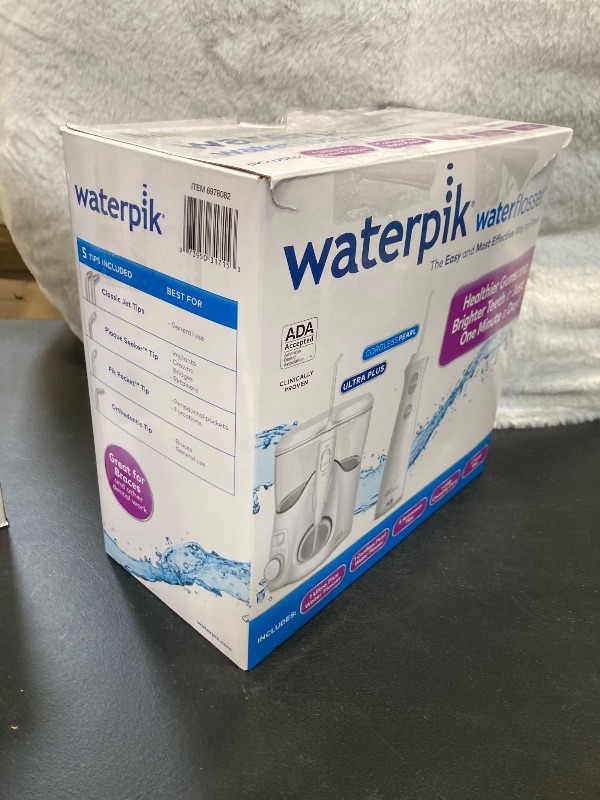 Photo 2 of Waterpik Ultra Plus and Cordless Pearl Water Flosser Combo Pack