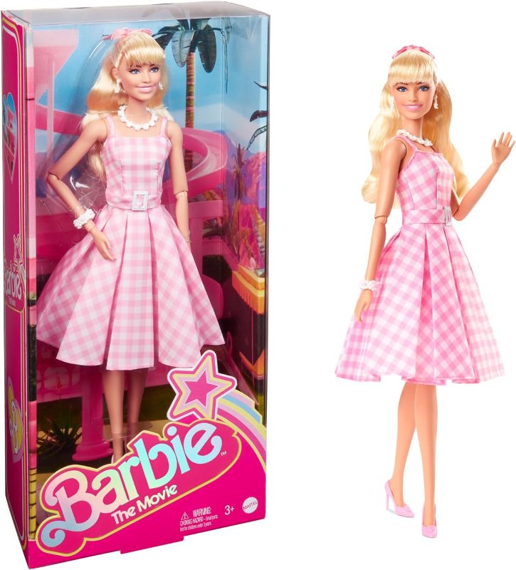 Photo 1 of Barbie The Movie Doll, Margot Robbie as, Collectible Doll Wearing Pink & White Gingham Dress with Daisy Chain Necklace
