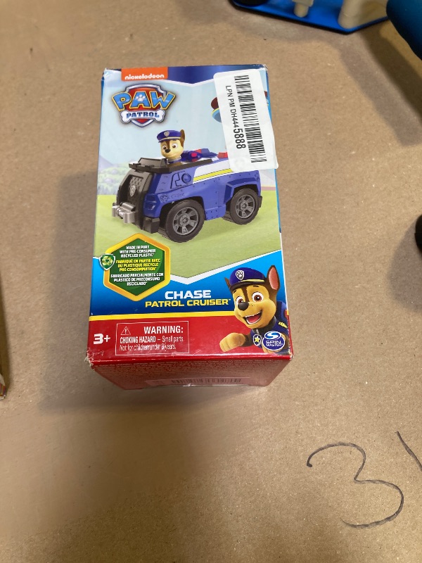 Photo 2 of Paw Patrol, Chase’s Patrol Cruiser, Toy Car with Collectible Action Figure, Sustainably Minded Kids Toys for Boys & Girls Ages 3 and Up